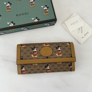 GUCCI X DISNEY WALLET<br>구찌 X 디즈니 장지갑<br><i>19x10x3.5cm 소가죽</i>